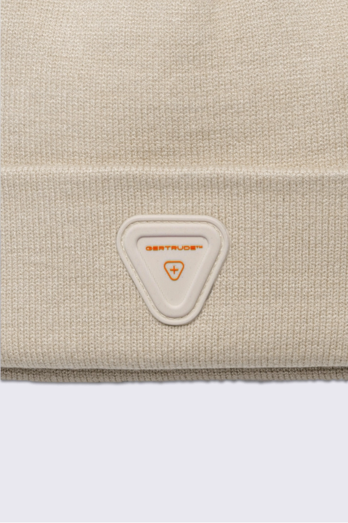 Jad unisex knit beanie in cream - Gertrude