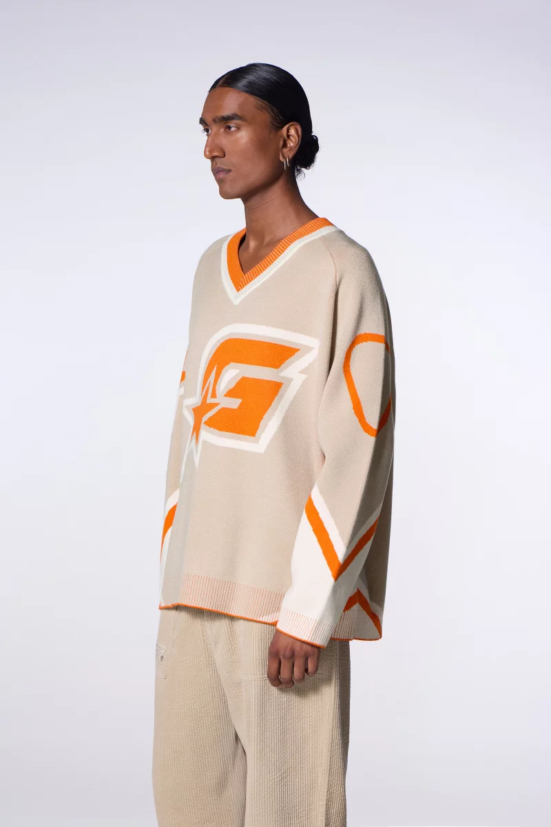 Pull mixte baseball en maille jacquard Herman daim - Gertrude Pull mixte baseball en maille jacquard Herman daim - Gertrude